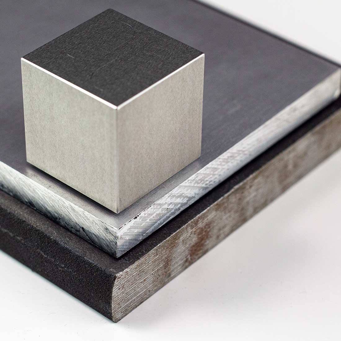 A MetMo Cube On a billet of metal