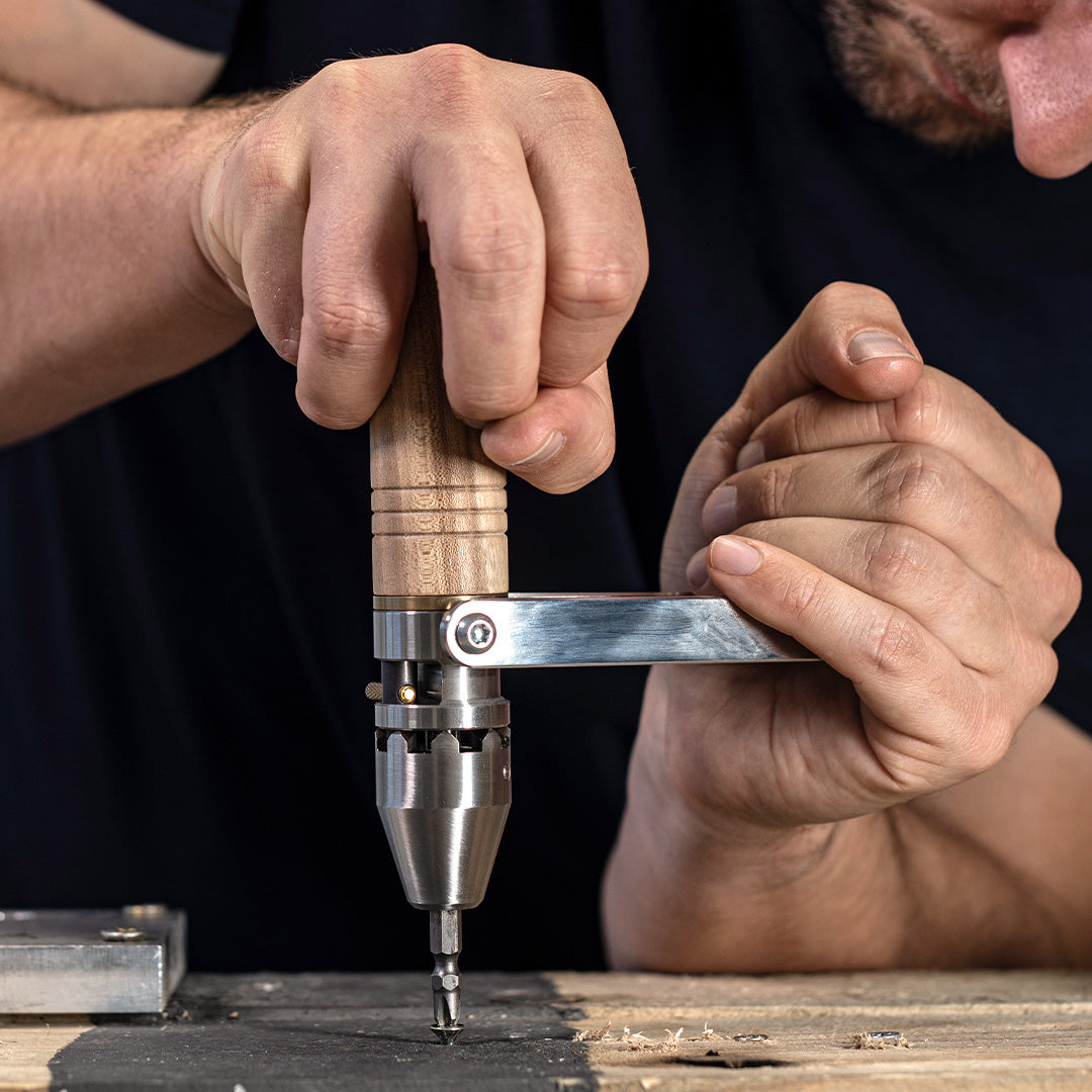 MetMo Driver being used to drive in a screw with power arm