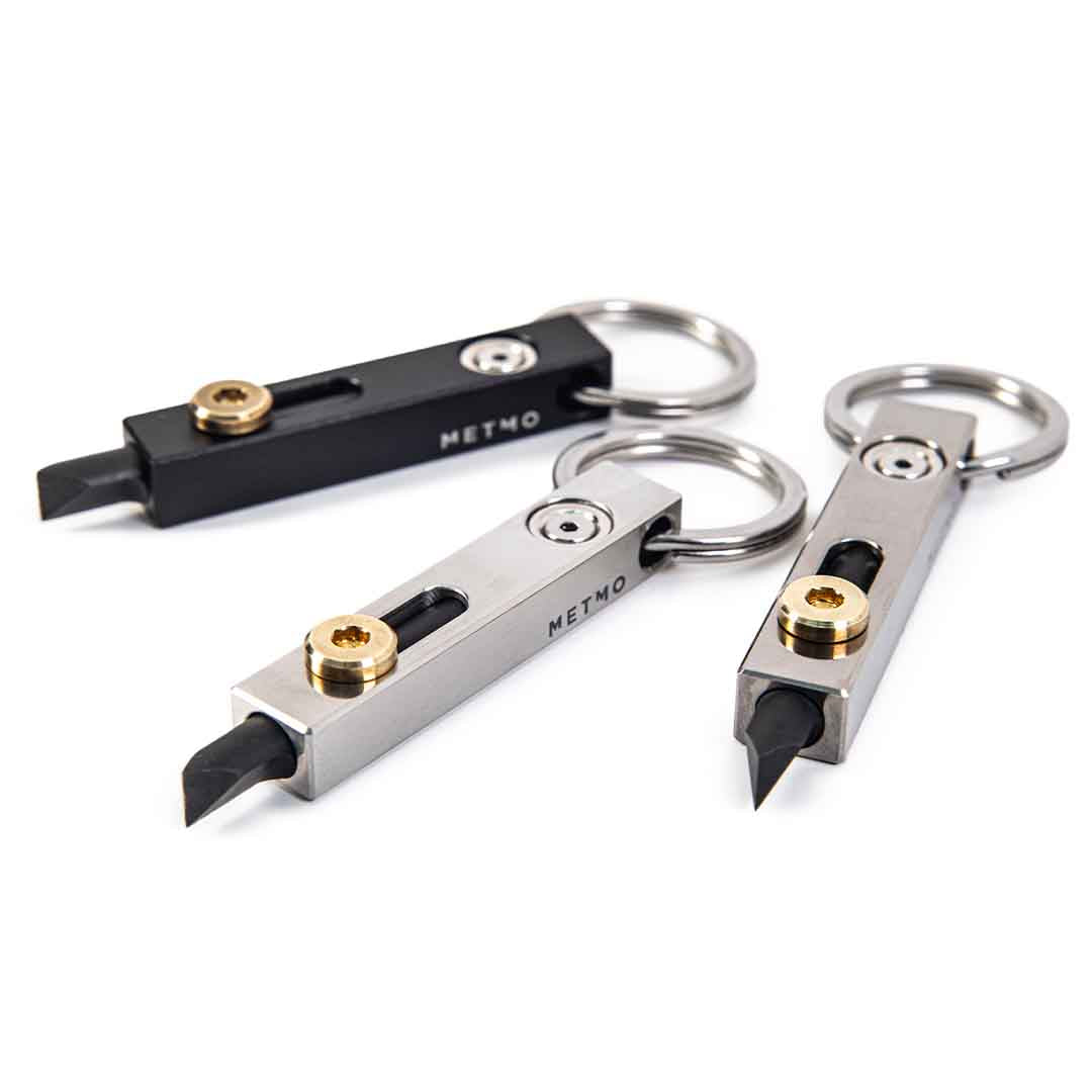 three metmo edge tools on a white background