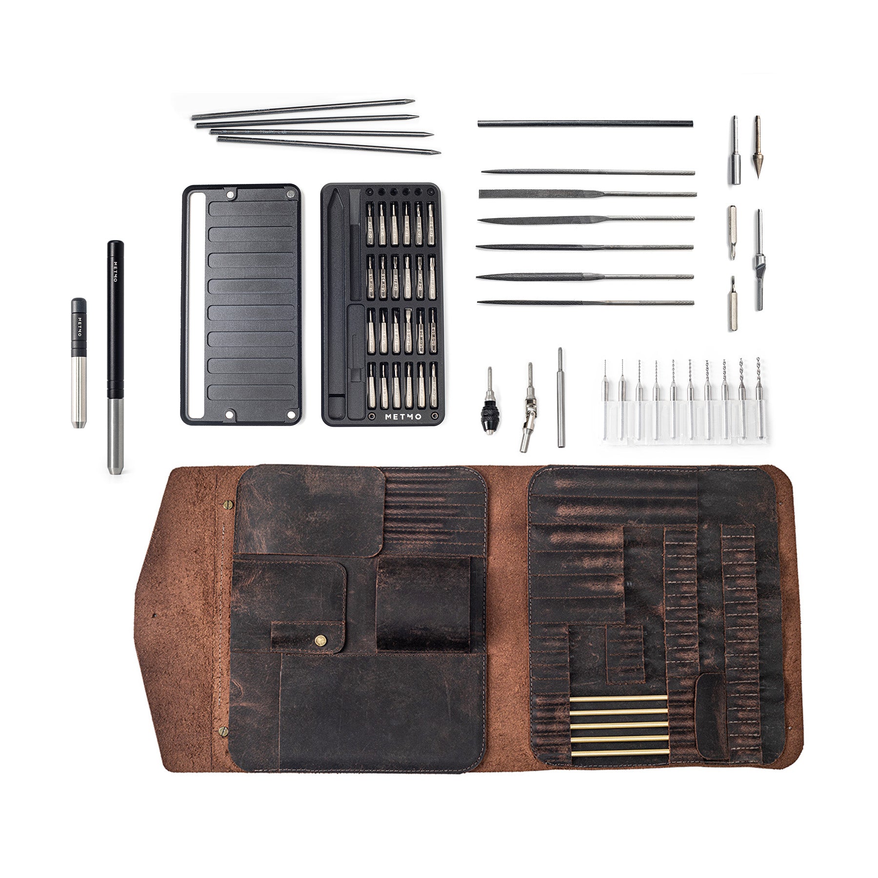 Multi Drive black steel with precision tools and a leather expansion kit on a white background