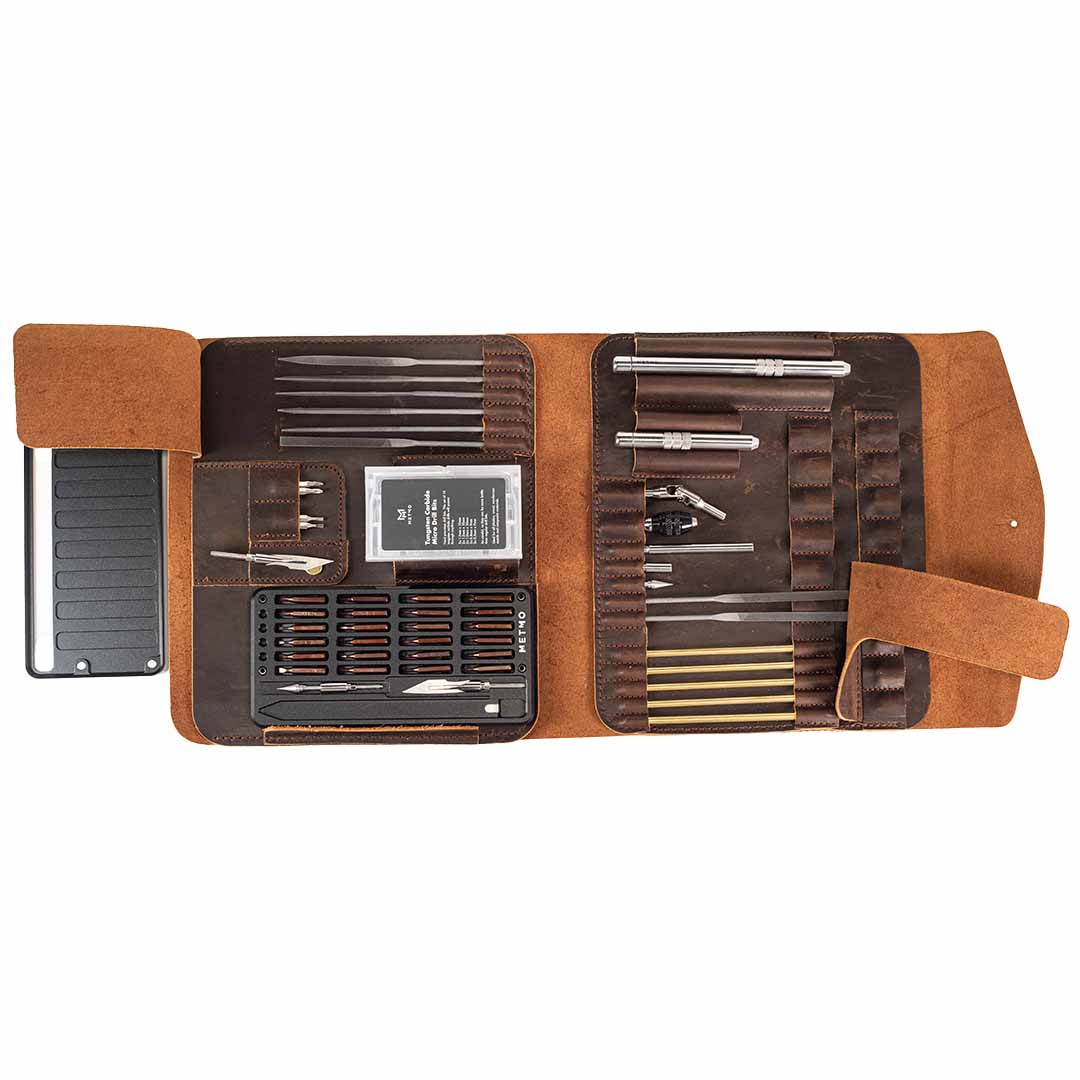 MetMo Multi Drive Leather Expansion Kit fully loaded, showing metal case contents and needle files