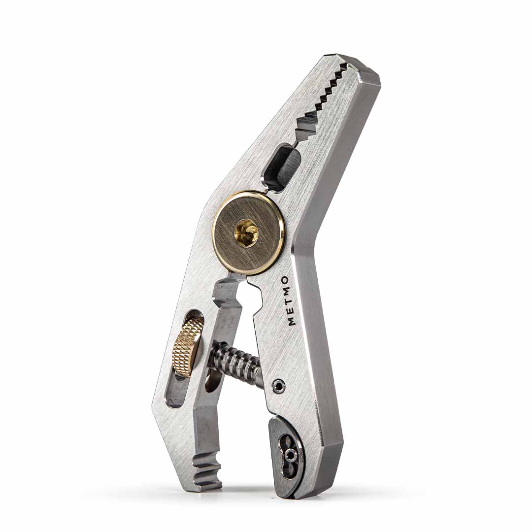 Steel Pocket Grip multitool with various uses on a white background