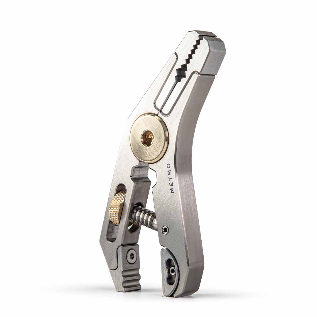 Titanium Pocket Grip multitool with various uses on a white background