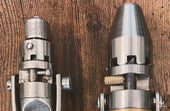 Stainless steel MetMo drivers on a workbench