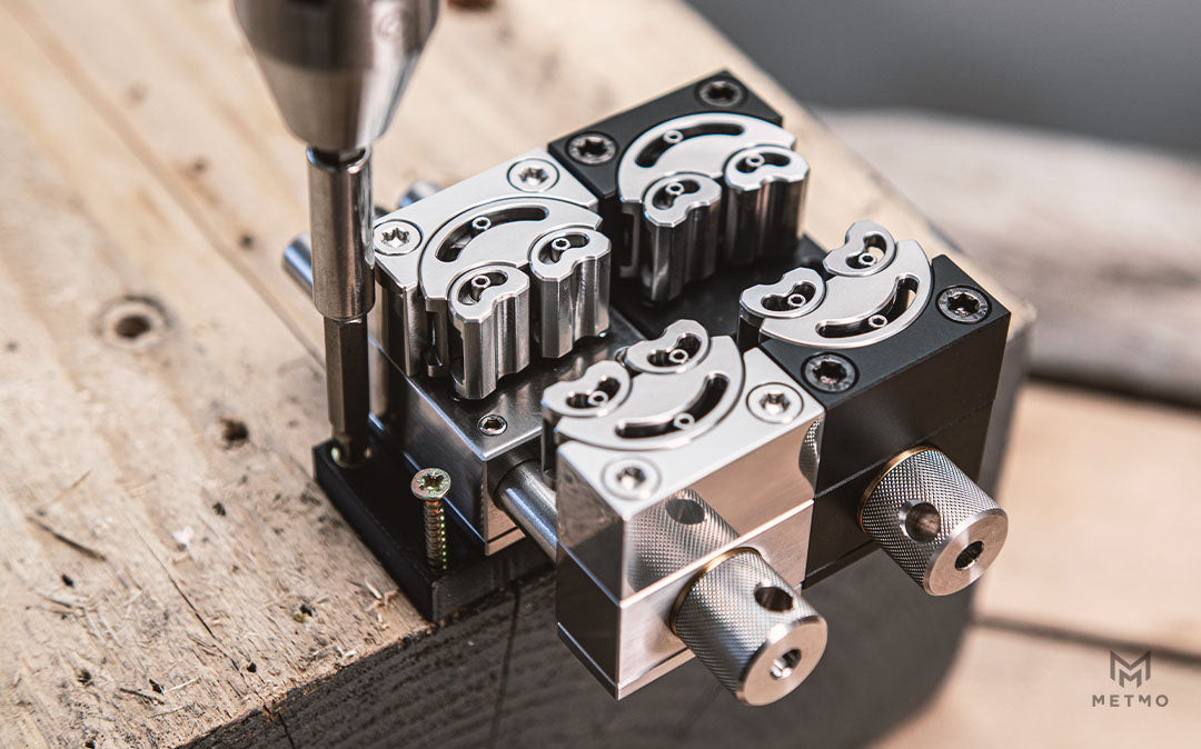 Adaptor plate bolted to bench