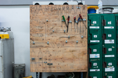 Organised tools on a peg board 