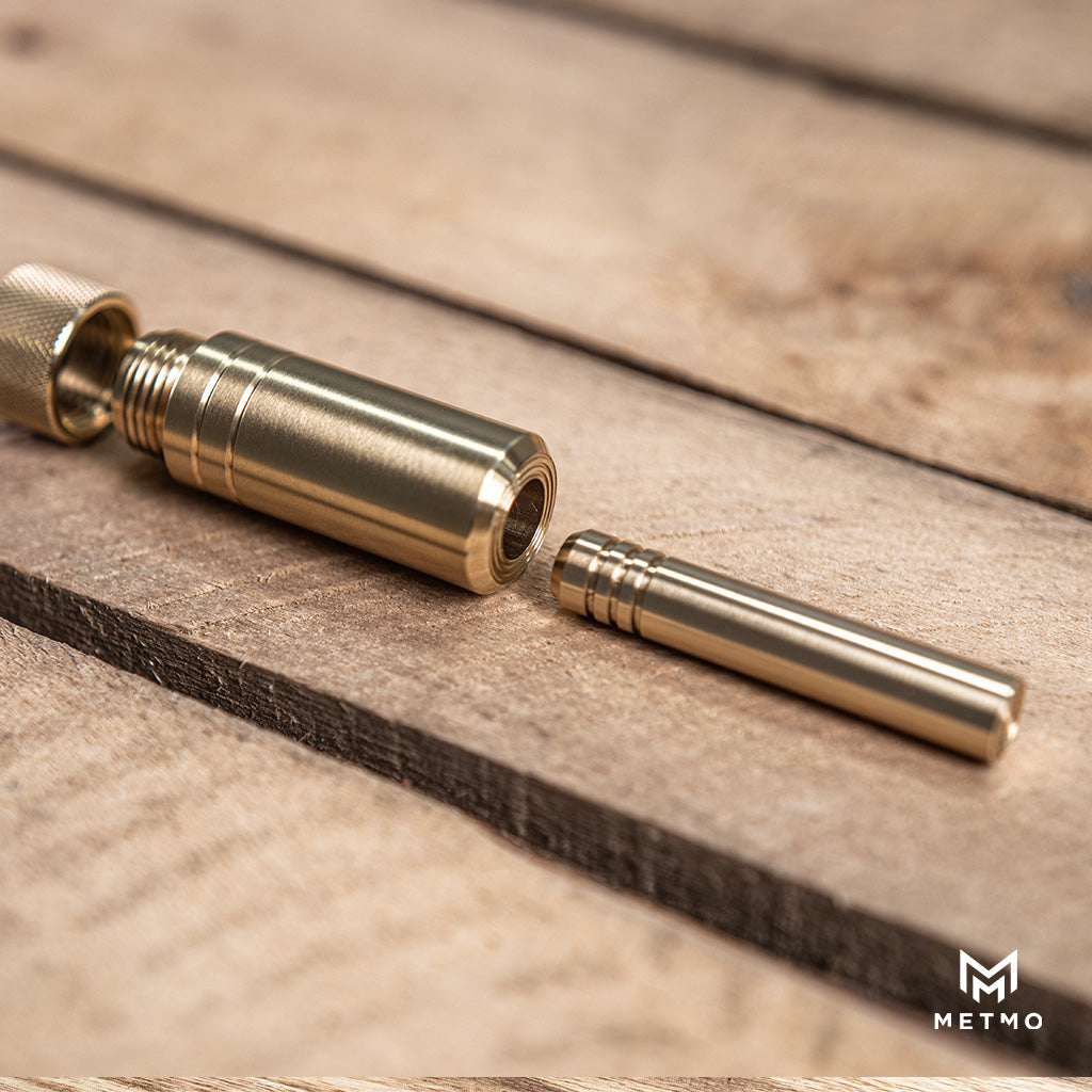 Brass piston fidget toy