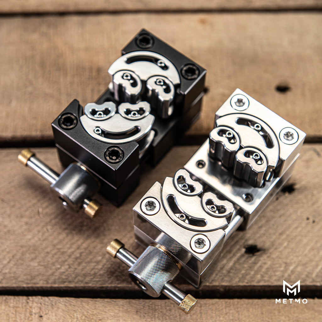 MetMo Fractal Vise pair On a work bench 