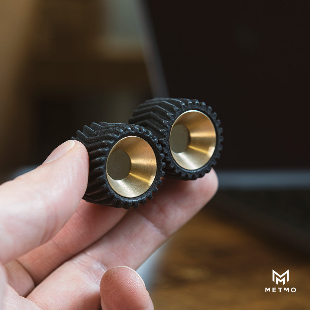 MetMo Helico Fidget toy held in a hand