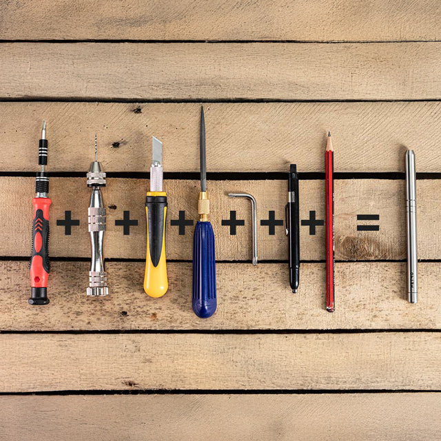 A stanley knife, allen key, pen, pencil, hand drill and screwdriver next to the MetMo Multi Drive. All the tools the MetMo Multi Drive can be used for. 
