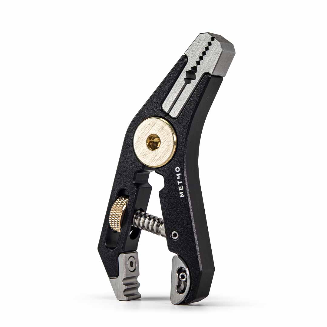 Black Pocket Grip multitool with various uses on a white background
