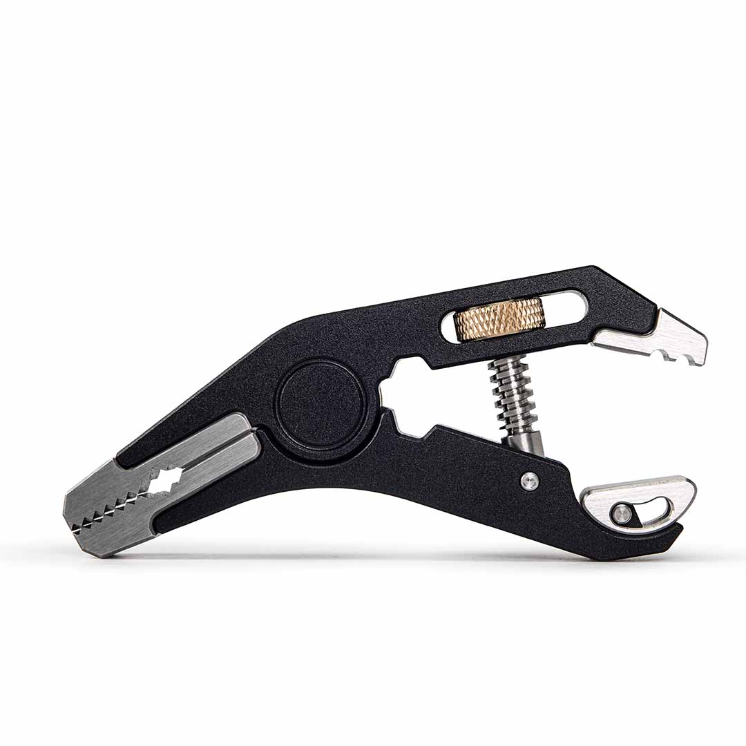 Black Pocket Grip multitool with various uses on a white background