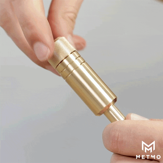 MetMo Piston Spinning on a hand