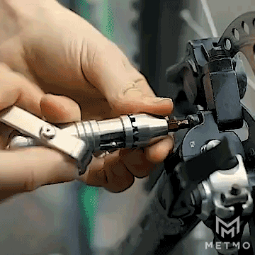 Animation of MetMo Pocket Driver being used to repair a bicycle.
