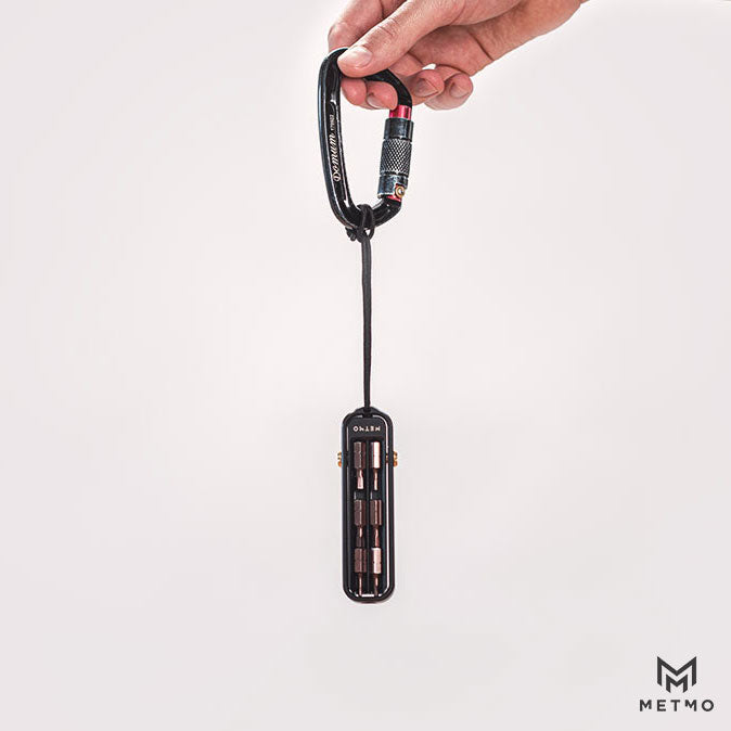 MetMo Magnetic bit case attached to a carabina.