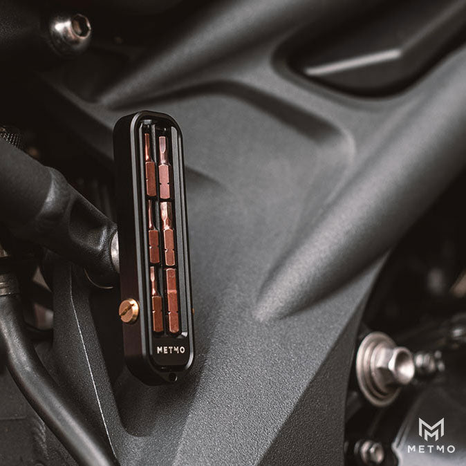 Magnetic Bit Case Attached to a motorbike frame. 