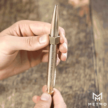 MetMo Brass pen Using one of its nuts to eject the nib