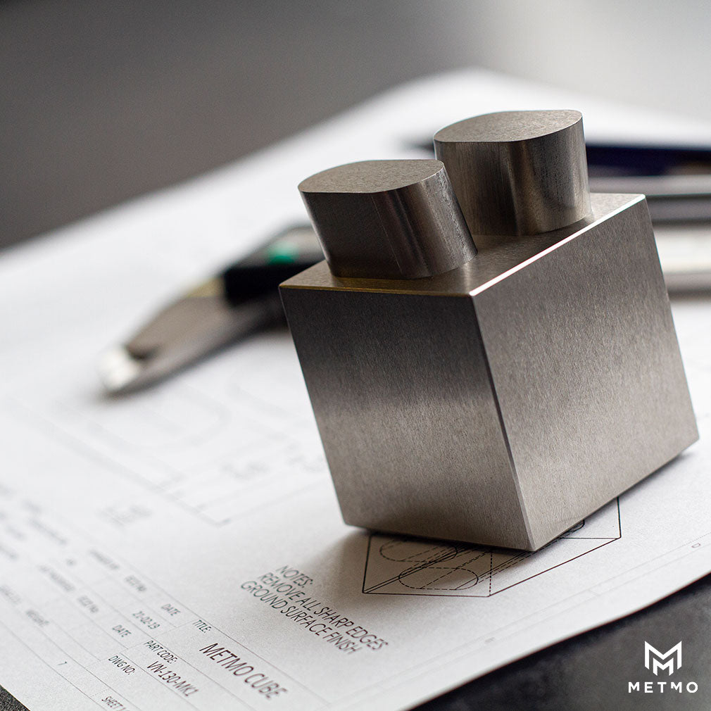 MetMo cube, with dropping pins on works drawings. 