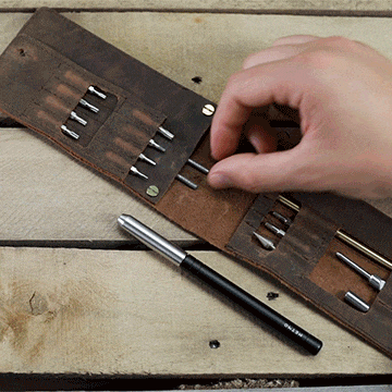 Removal of tools from the MetMo Multi Drive Leather Case.