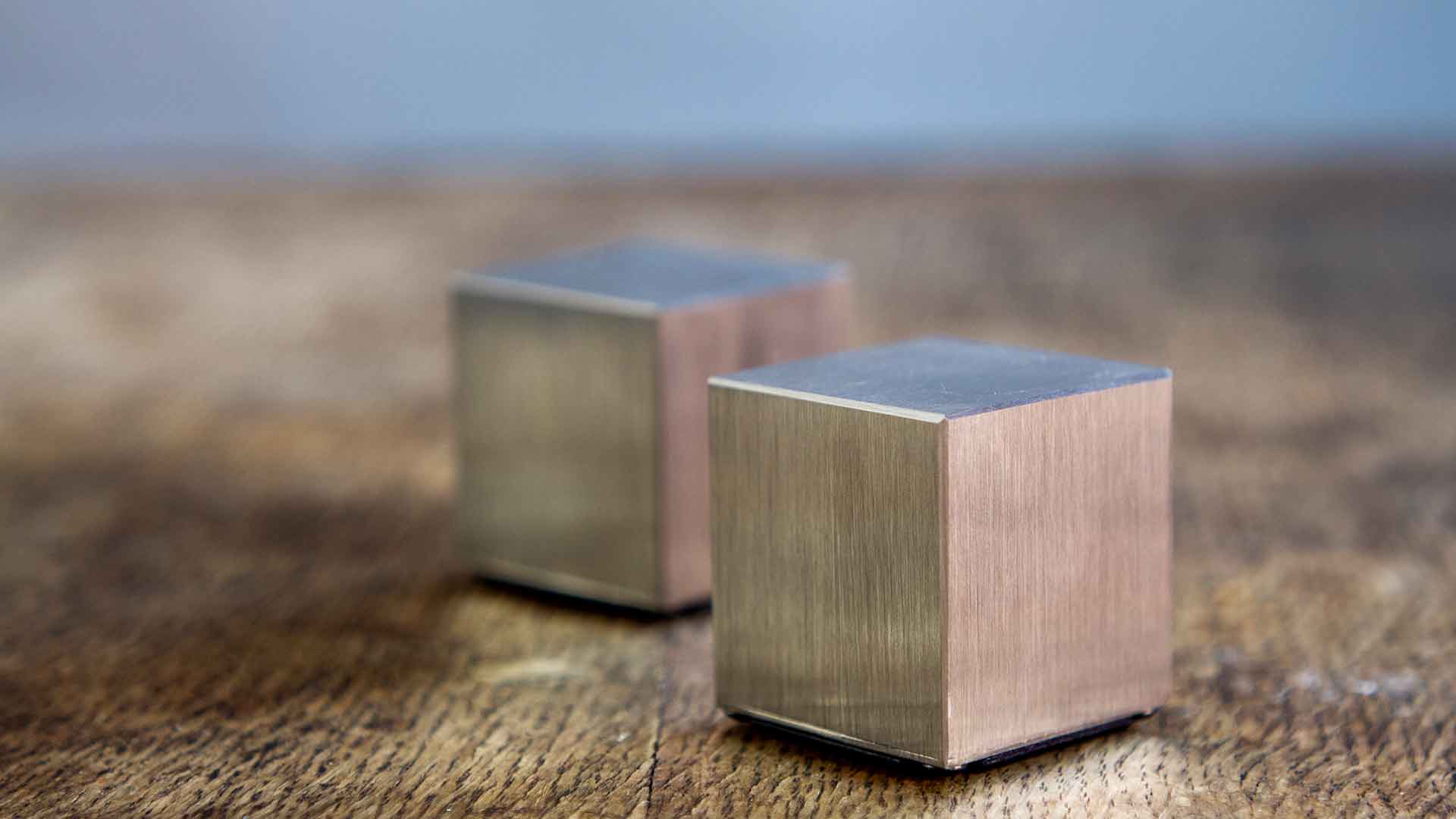 Two MetMo Cubes on a table.