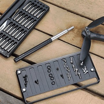 Animation of person using the MetMo Multi Drive, with all its tool attachments, to  fix a small fan. 