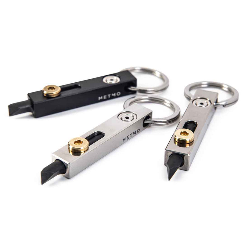 three metmo edge tools on a white background