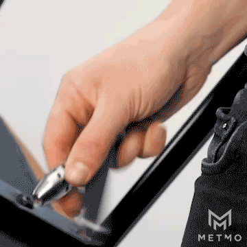 Animation flicking open the MetMo Pocket Driver and using it to tighten a screw on a table. 