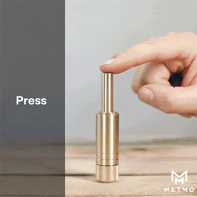 MetMo Piston, air fidget toy being played with