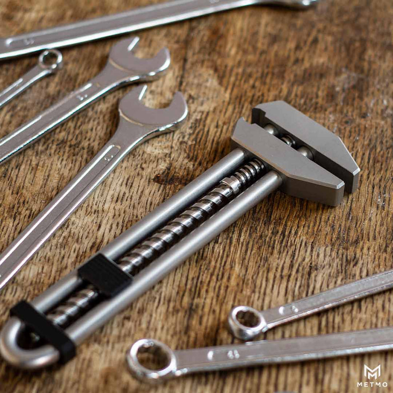 MetMo Grip, on a workbench with spanners, and wrenches.  