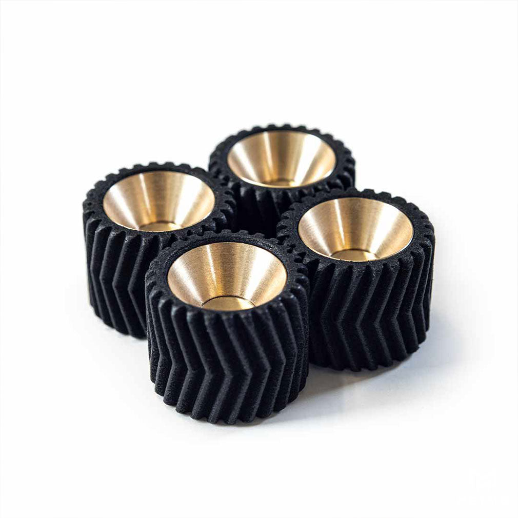 A set of 4 MetMo Helico herringbone gears connected together 