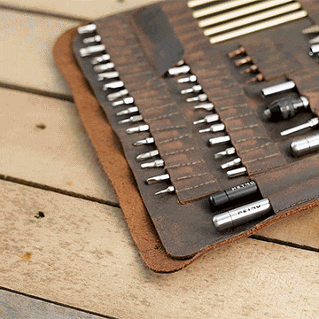 Animation of person removing the MetMo Multi Drive tool from the the Multi Drive Expansion Kit which is filled with a wide range of tool attachments.