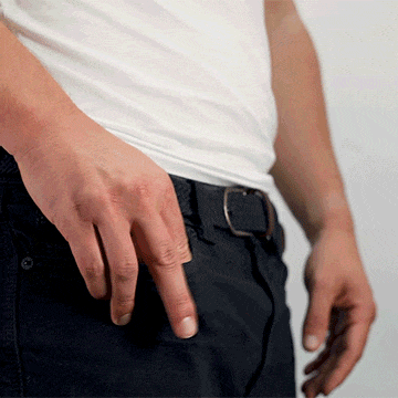 Person removing and opening the MetMo Multi Drive Leather Case.