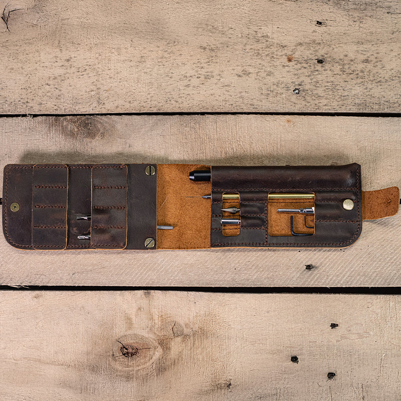 MetMo Multi Drive Leather Case open with a number of tools encased.