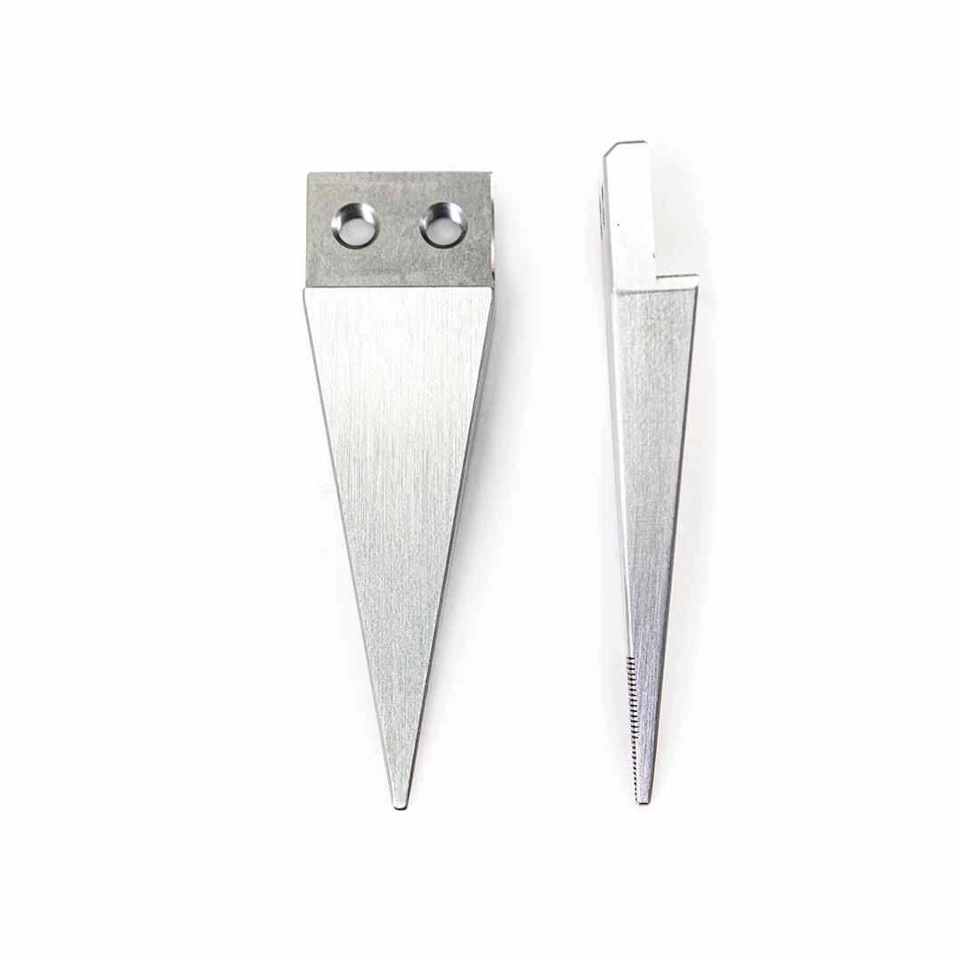 Two silver metal wedge-shaped tool tips with different edge grooves and attachment holes, displayed side-by-side on a plain white background.