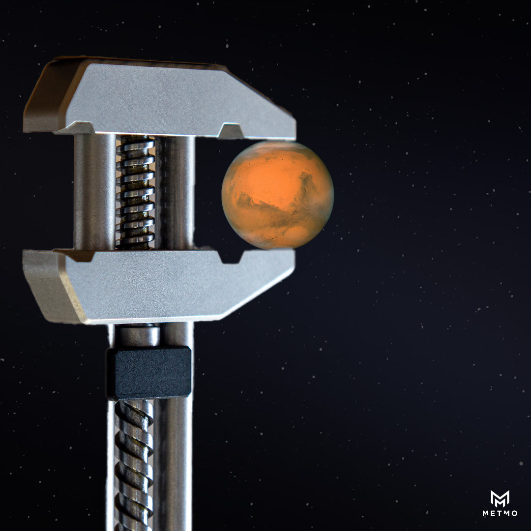 Image showing a giant metmo grip grabbing on to the planet Mars