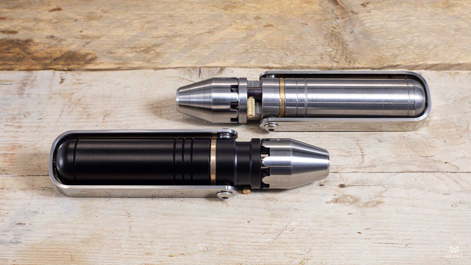 Black and stainless steel Drivers side by side