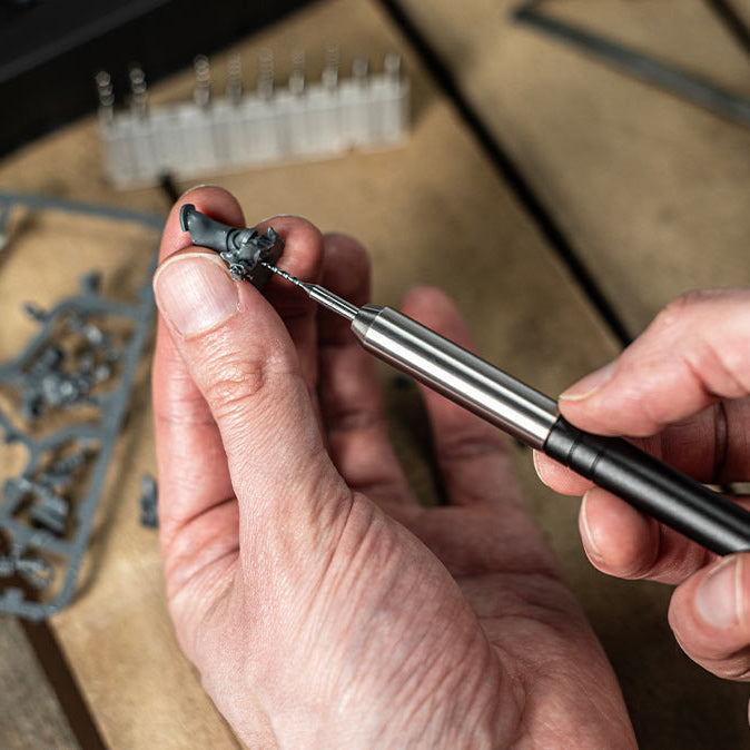 MetMo Multi Drive being used with a small drill attachment.