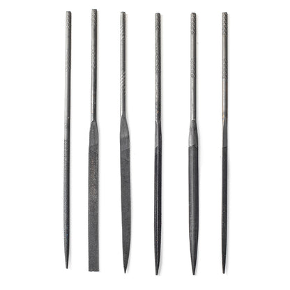 6 needle files on a white background