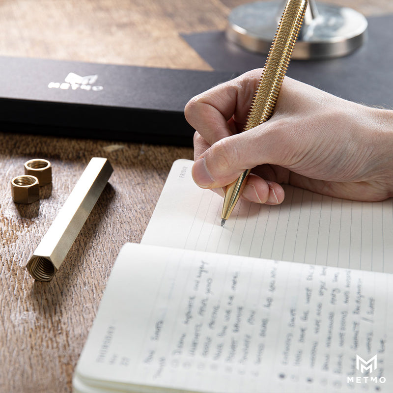Writing notes with the MetMo Brass pen 