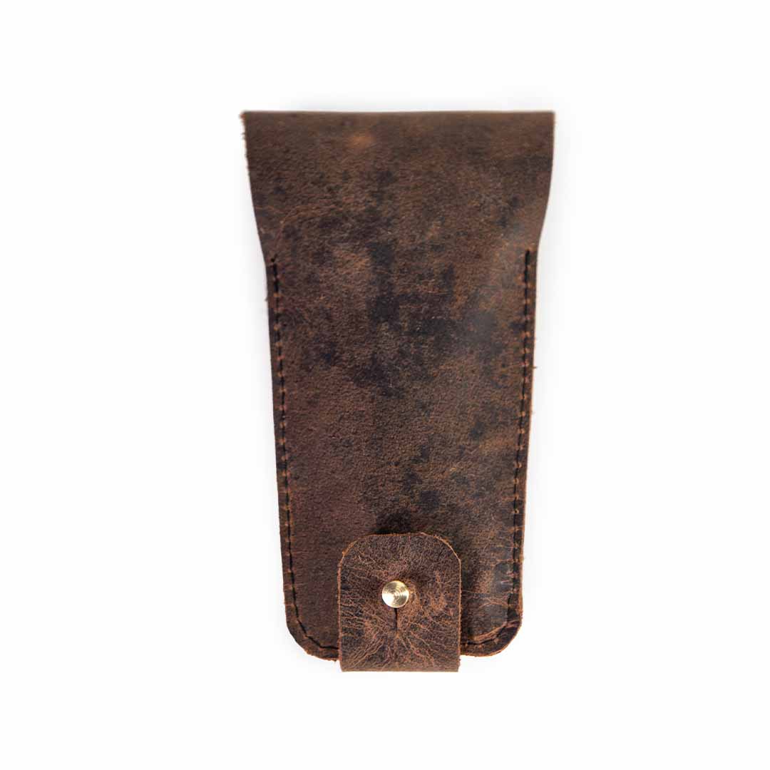 Brown leather pouch with a gold button on a white background