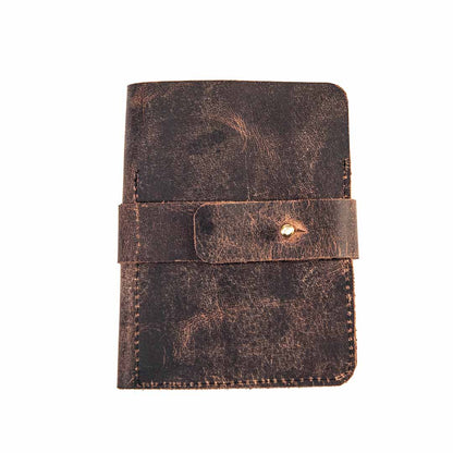 Brown leather pouch with a strap closure on a white background
