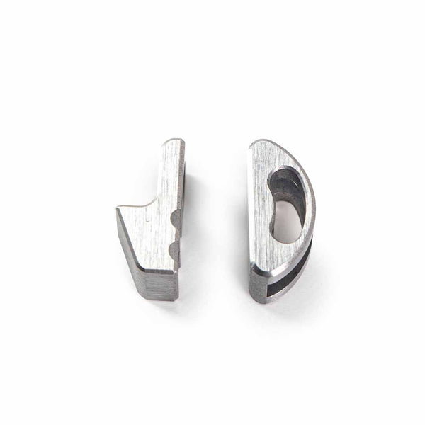 Close up of adaptive jaw for pocket grip on white background