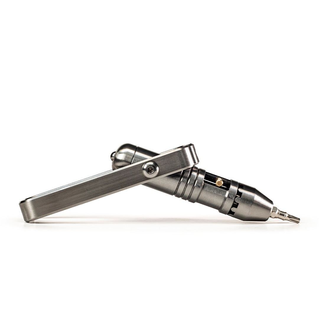 Titanium ratchet screwdriver with an open handle on a white background