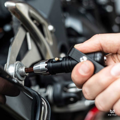 Tool - MetMo Black Pocket Driver used on a Motorbike