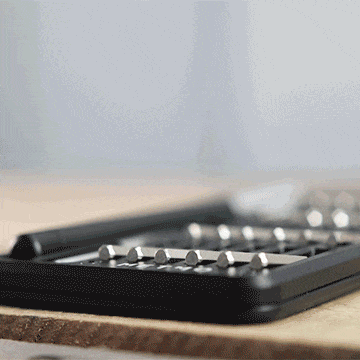 Animation of micro drive bits popping out of MetMo Multi Drive metal case.