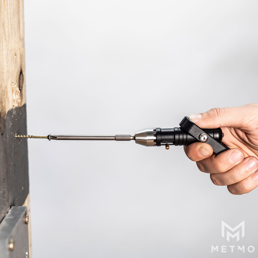 MetMo Pocket Driver being used to drive screw into wood.