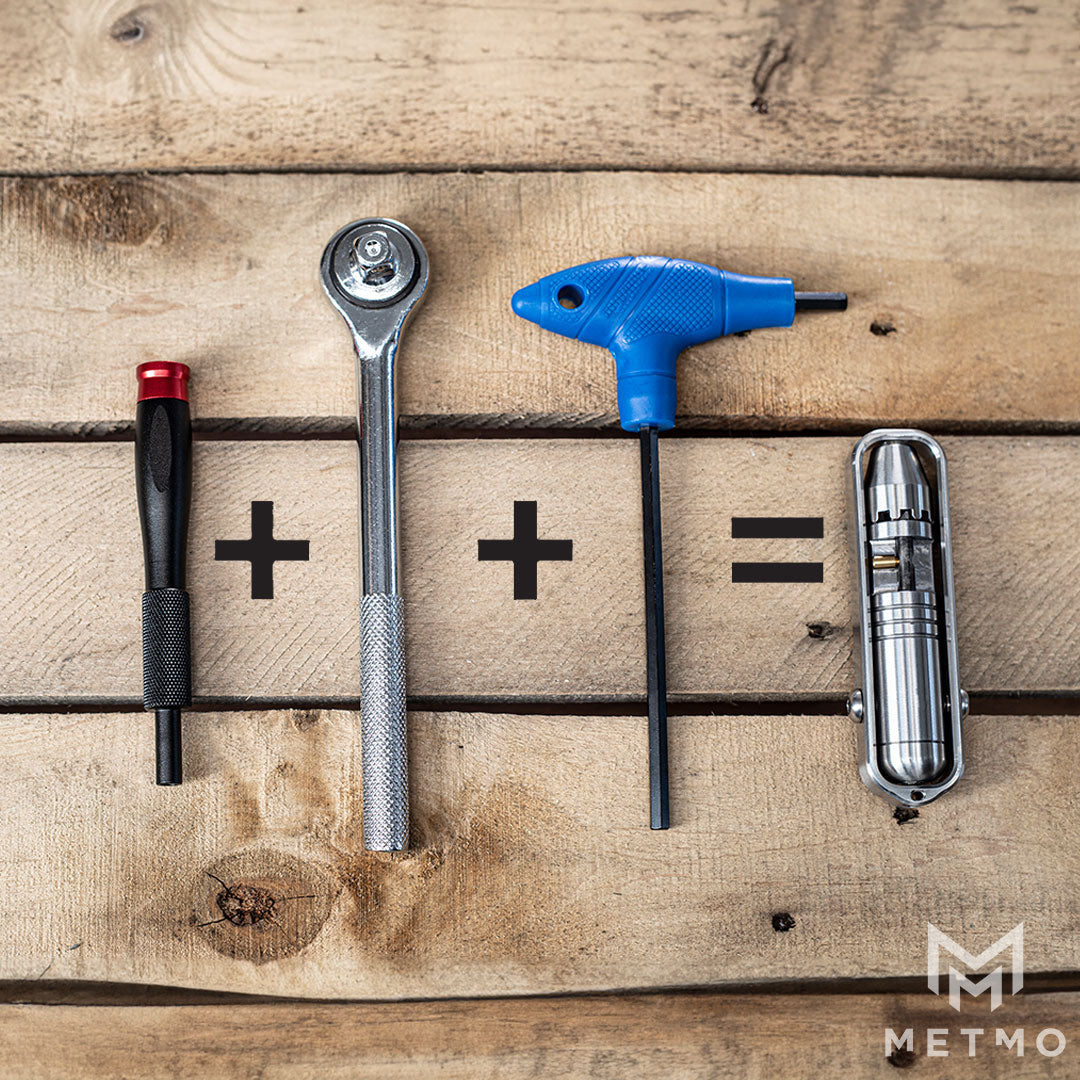 A screwdriver, a T driver and a ratchet wrench next to the MetMo Pocket Driver, highlighting the versatility of the pocket driver.