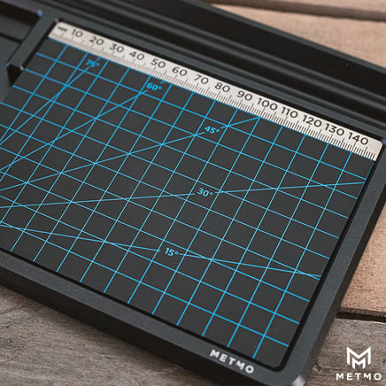 desktop workstation cutting board image showing ruler grid and angle measurements