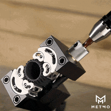 fractal vice gif tightening on a round rubber object as it is squashed and held in place