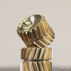 Brass helico balanced one on top of another, 360 spin view